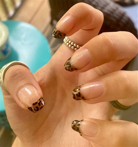 leopard print nails french tip.